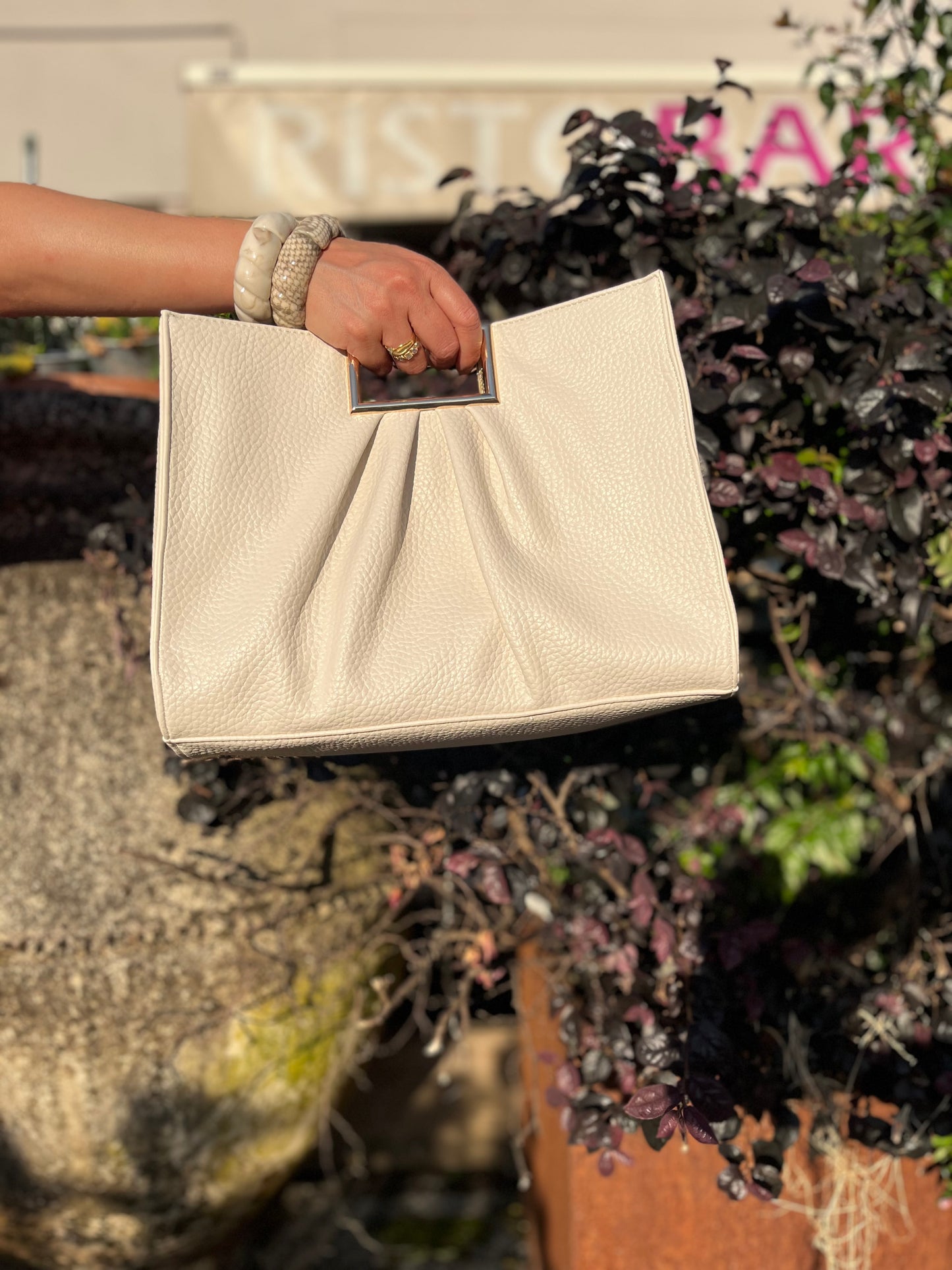 Borsa a mano arricciata