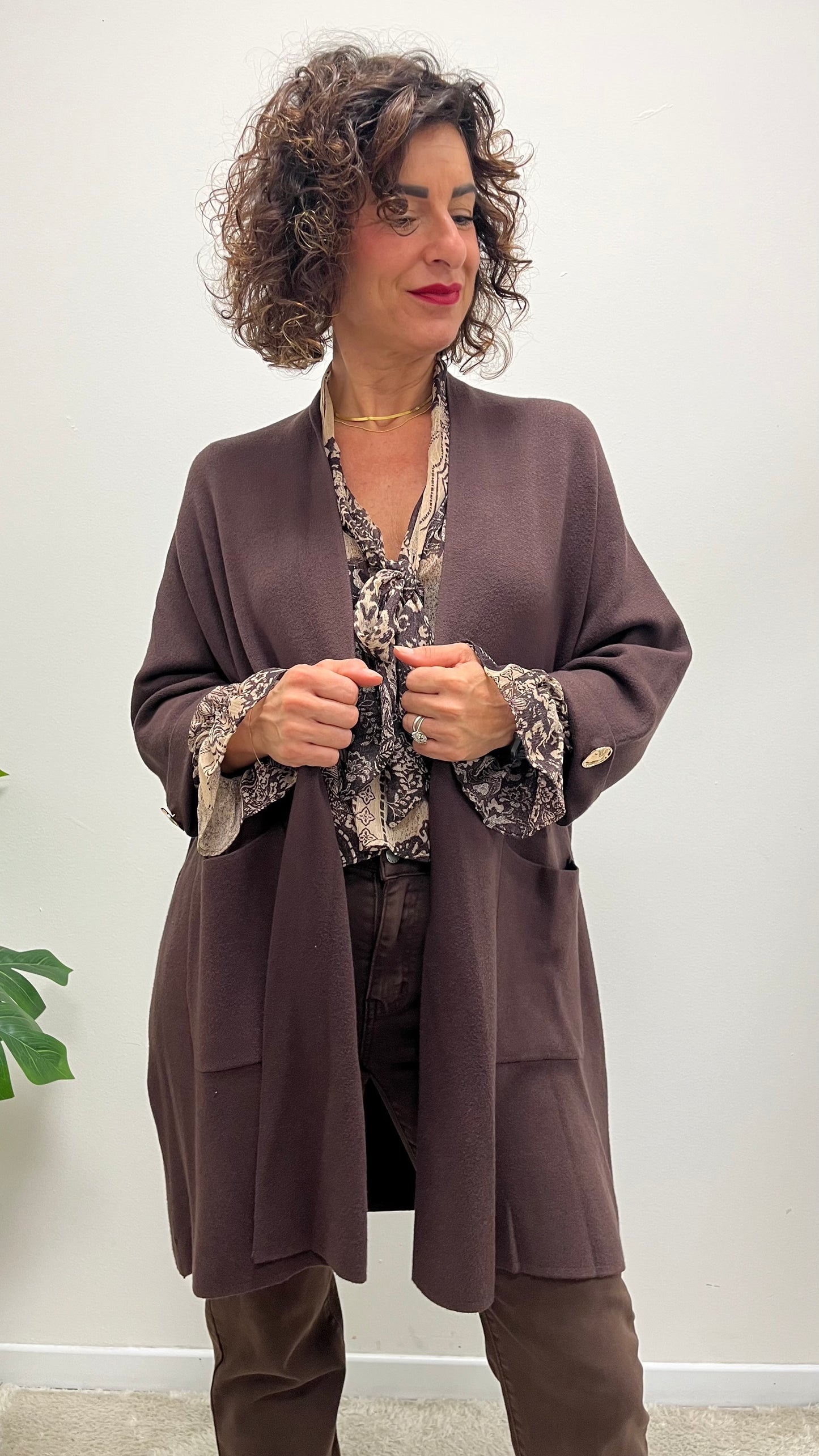 Cappottino in maglia spolverino bottone gioiello