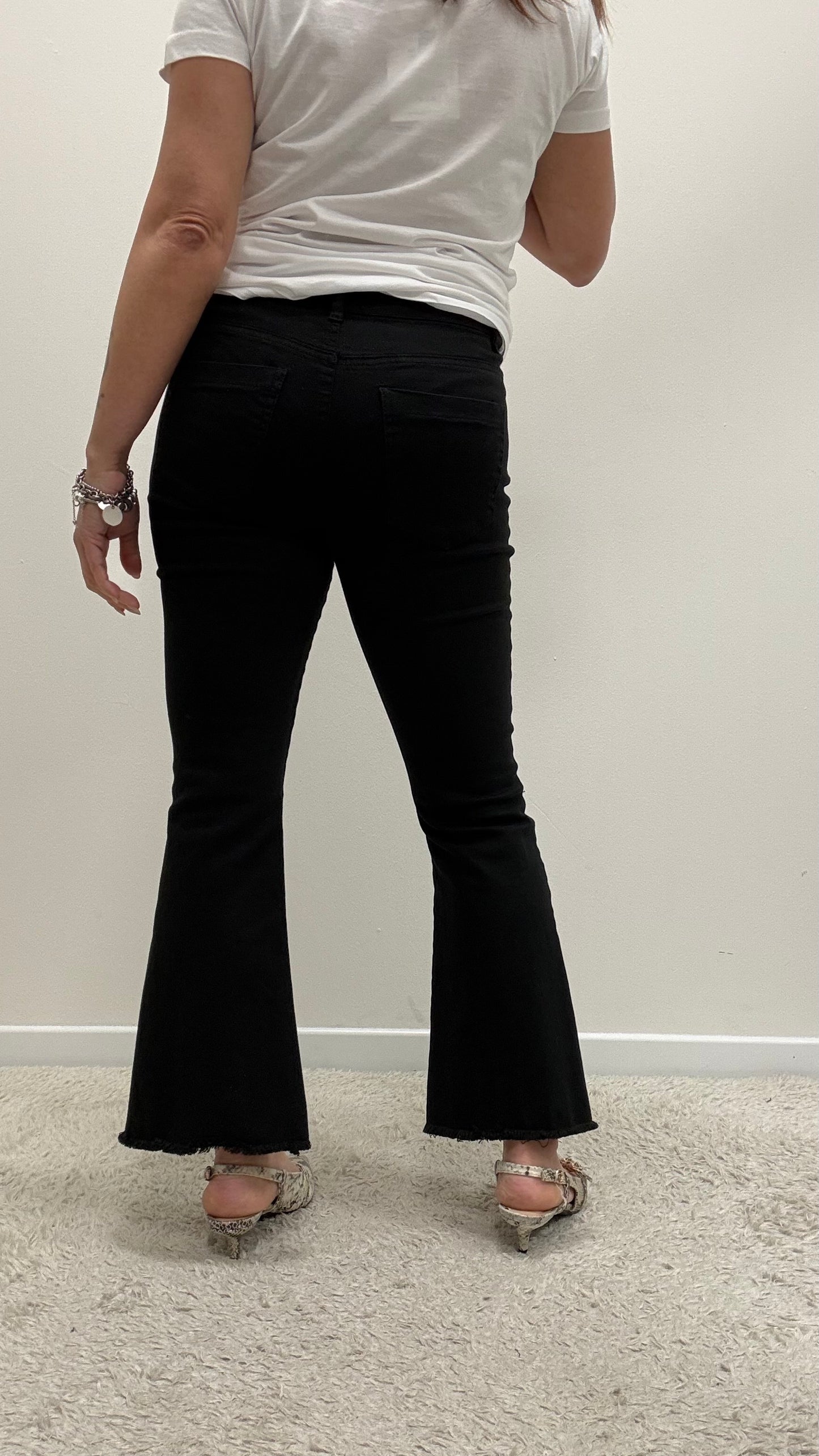 Pantaloni trombetta sfrangiati Kiki Six