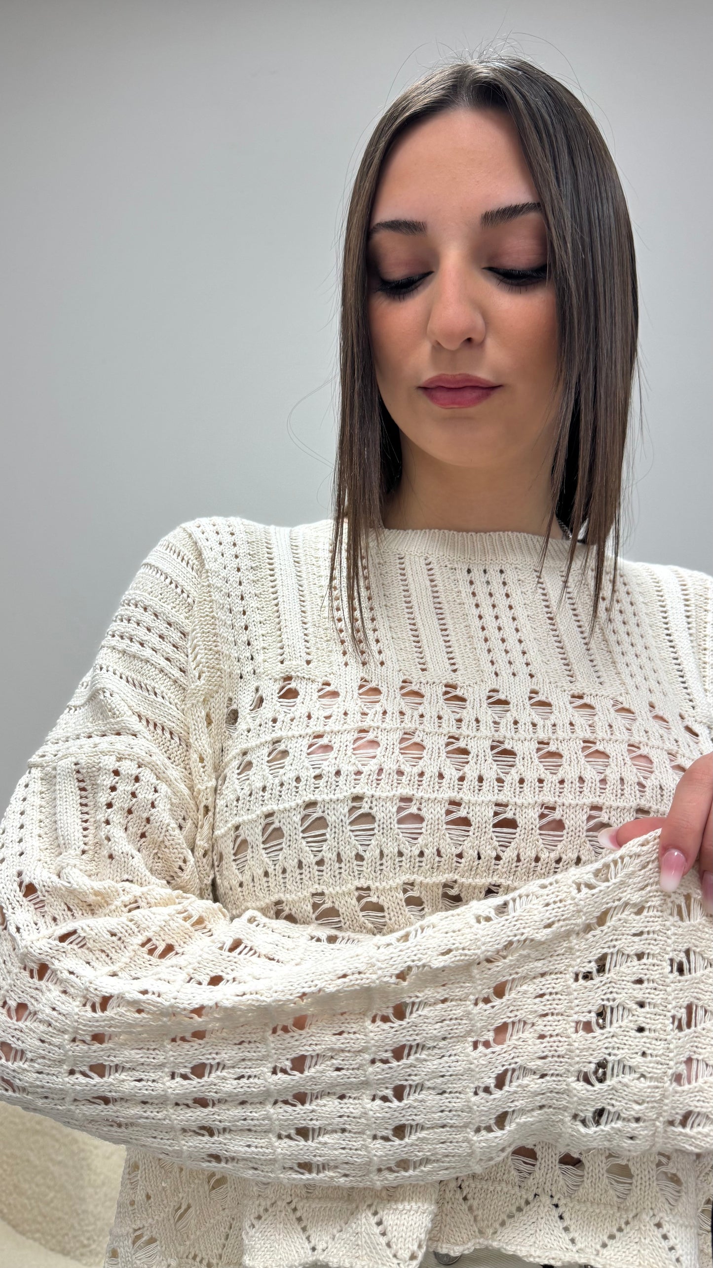 Maglia paricollo traforata con spacchetto dietro  Haveone