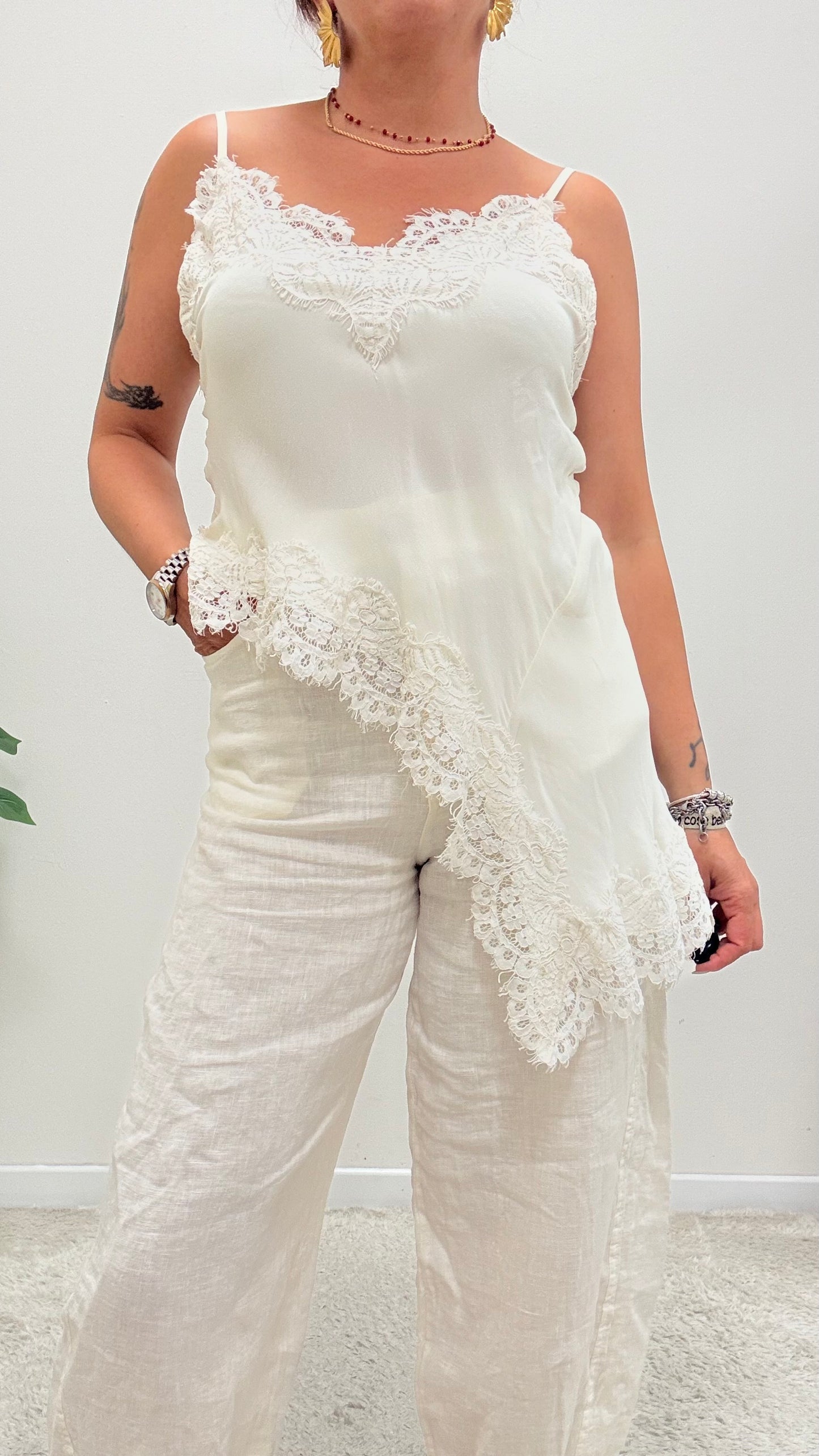 Top asimmetrico pizzo Tensione In